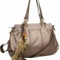 attractive brown patent leather with fox tail embellished handbag