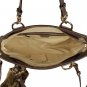 attractive brown patent leather with fox tail embellished handbag