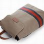 white patent leather dark with red stripped handbag