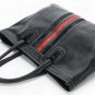 black patent leather with black bag and red stripped embellished handbag
