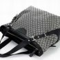 grey patent leather with monogram embellished handbag