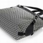 grey patent leather with monogram embellished handbag