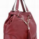 stunning patent leather handbag/bordeaux color with palpus embellished handbag