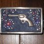 This smoking gun belt buckle is for the ladies!