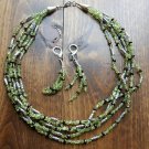 Item 128- 19" five strand peridot, garnet & Tibetan silver necklace w/earrings.