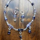 tem 129- 15.5" Quartz and purple fluorite necklace, with matching earrings.