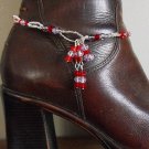Item 74- 12" Boot bracelet of red, pink and clear glass.