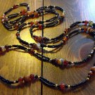 Item 102- 50" Multicolored agate, glass and gold plate necklace.