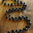Item 15- 31" Peridot and antique black glass necklace.