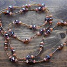 Item 47- 37" Glass, amethyst & sunstone necklace.