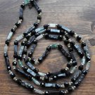 Item 38- 47" Fluorite, serpentine, & grossularite necklace.  With earrings.
