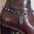 Item 83- 13" boot bracelet. glass, enamel & silverplate.