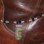 Item 83- 13" boot bracelet. glass, enamel & silverplate.