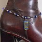 Item 83- 13" boot bracelet. glass, enamel & silverplate.