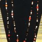 Item 29- 54" Agate, antique glass and brass necklace.