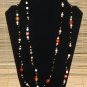Item 29- 54" Agate, antique glass and brass necklace.