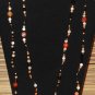Item 29- 54" Agate, antique glass and brass necklace.