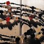 Item 29- 54" Agate, antique glass and brass necklace.