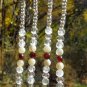 Item 50- 9" suncatcher: glass garnet, agate.