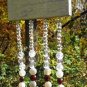 Item 50- 9" suncatcher: glass garnet, agate.