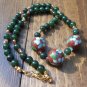 Item 119- 17" cloisonne, gold plate, olive quartz and tourmaline necklace.