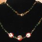 Item 119- 17" cloisonne, gold plate, olive quartz and tourmaline necklace.