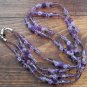 Item 44- 21" Double strand amethyst, glass, and silverplate necklace.