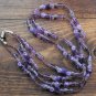 Item 44- 21" Double strand amethyst, glass, and silverplate necklace.