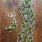 Item 128- 19" five strand peridot, garnet & Tibetan silver necklace w/earrings.