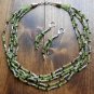 Item 128- 19" five strand peridot, garnet & Tibetan silver necklace w/earrings.