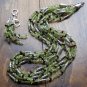 Item 128- 19" five strand peridot, garnet & Tibetan silver necklace w/earrings.
