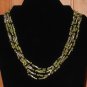 Item 128- 19" five strand peridot, garnet & Tibetan silver necklace w/earrings.