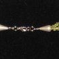 Item 128- 19" five strand peridot, garnet & Tibetan silver necklace w/earrings.