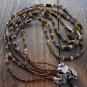 Item 72- 22" Three strand tiger eye, grossularite, glass & silverplate necklace.