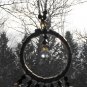 Item 99- 4" suncatcher: gold 'leather' wrap, and glass.