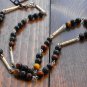 Item 63- 19" Tiger eye, olive quartz & silverplate necklace.  With earrings.