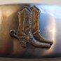 Silvertone & brass belt buckle with cowboy boot detail.