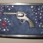 This smoking gun belt buckle is for the ladies!