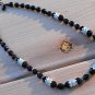 Item 6- 17" silverplate, tourmaline & antique black glass necklace.