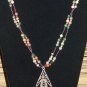Item 88- 20" jasper, glass & silverplate necklace. With pewter pendant.