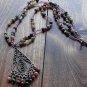 Item 88- 20" jasper, glass & silverplate necklace. With pewter pendant.