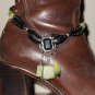 Item 138- 13.5" Glass, silver & serpentine boot bracelet.