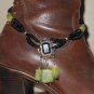 Item 138- 13.5" Glass, silver & serpentine boot bracelet.