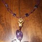 Item 139- 13.5" Glass, amethyst & goldplate boot bracelet.