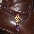 Item 139- 13.5" Glass, amethyst & goldplate boot bracelet.