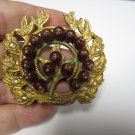 Vintage pin brooch laural leaf gold tone with brownish beads very different