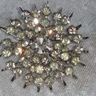 Vintage pin brooch star burst clear rhinestones nice loads or rhinestones