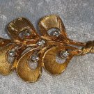 Vintage pin brooch gold tone 6 leaf with clear rhinestones in it flower leaf