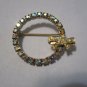 Vintage pin brooch bow circle pastel aurora borealis rhinestones gold tone