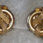 signed crown Trifari ribbon earrings elegant vintage gold tone timeless ribbed